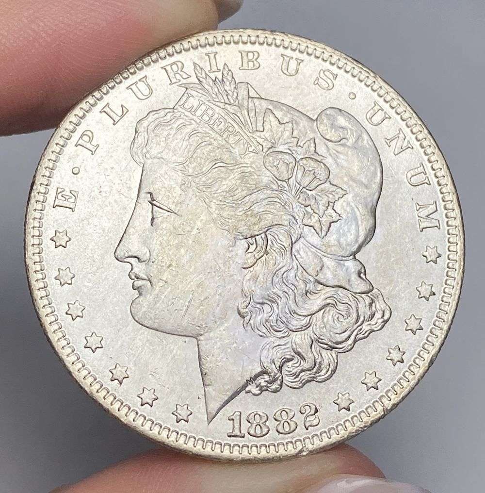 1882-O Morgan Silver Dollar MS63: Winner shall receive the exact coin shown here. (RR)
