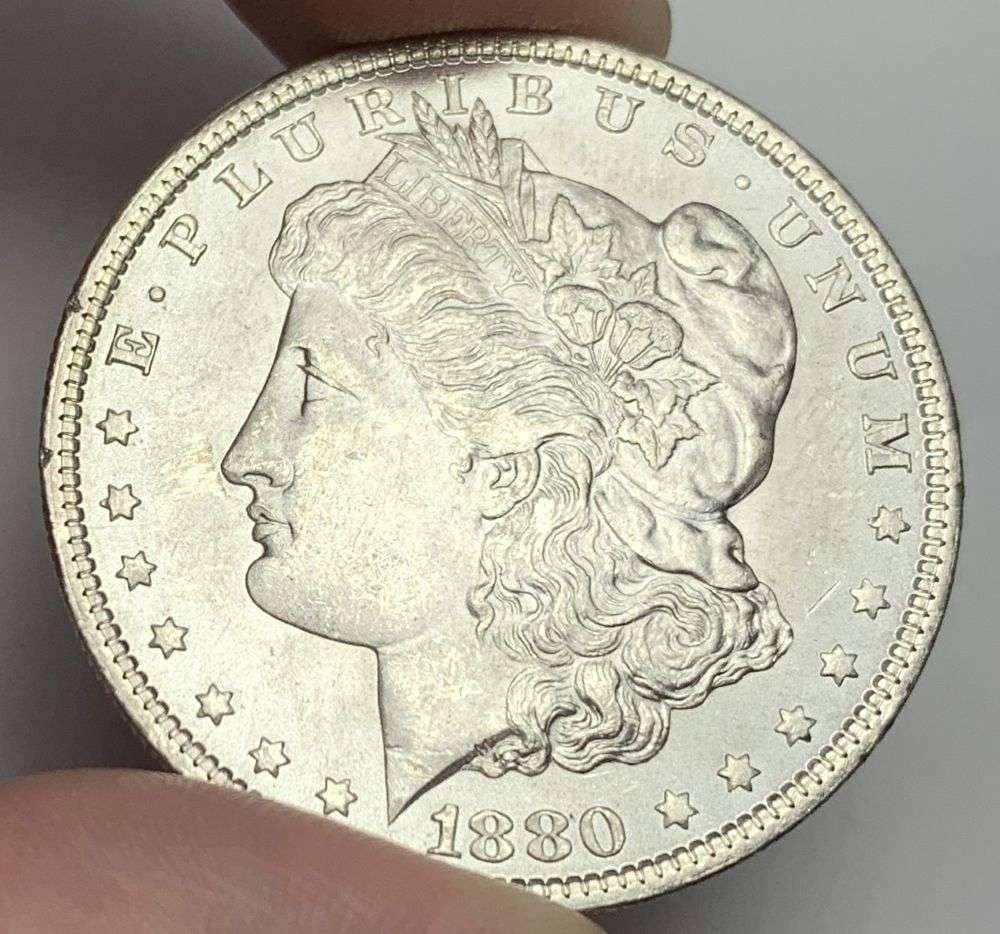 1880 Morgan Silver Dollar MS65: A very special consignment. Once in a great while, some really, really nice silver dollars will hit the market. These coins come from a old, old-timer! By order of the consignor, none of these coins a