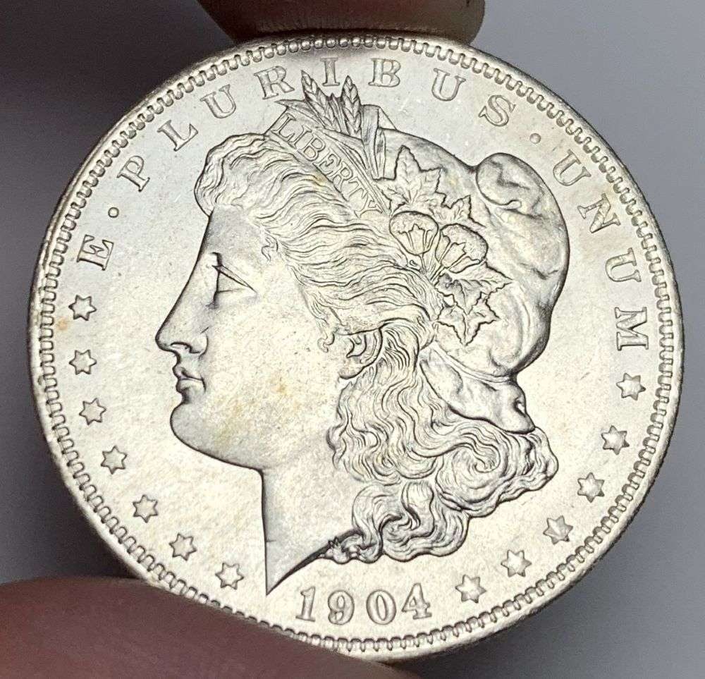 1904-O Morgan Silver Dollar MS66: A very special consignment. Once in a great while, some really, really nice silver dollars will hit the market. These coins come from a old, old-timer! By order of the consignor, none of these coins a