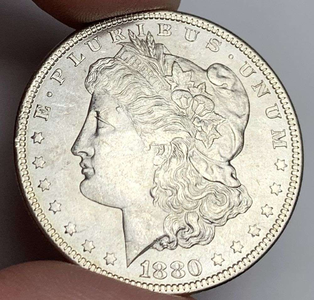 1880 Morgan Silver Dollar MS64: A very special consignment. Once in a great while, some really, really nice silver dollars will hit the market. These coins come from a old, old-timer! By order of the consignor, none of these coins a