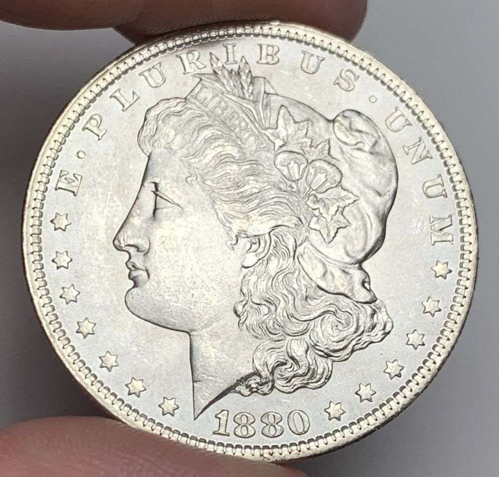 1880 Morgan Silver Dollar MS65: A very special consignment. Once in a great while, some really, really nice silver dollars will hit the market. These coins come from a old, old-timer! By order of the consignor, none of these coins a