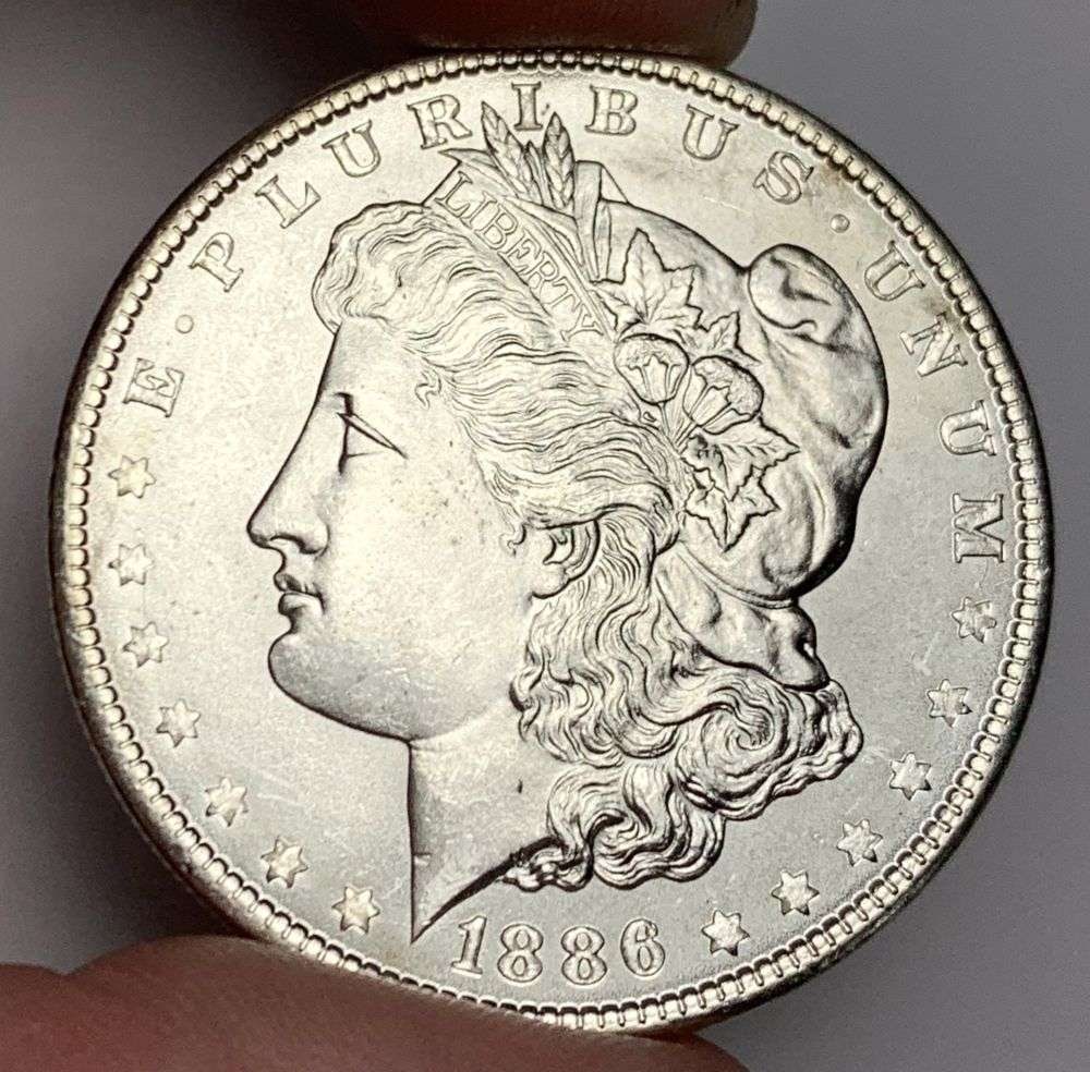 1886 Morgan Silver Dollar MS66: A very special consignment. Once in a great while, some really, really nice silver dollars will hit the market. These coins come from a old, old-timer! By order of the consignor, none of these coins a