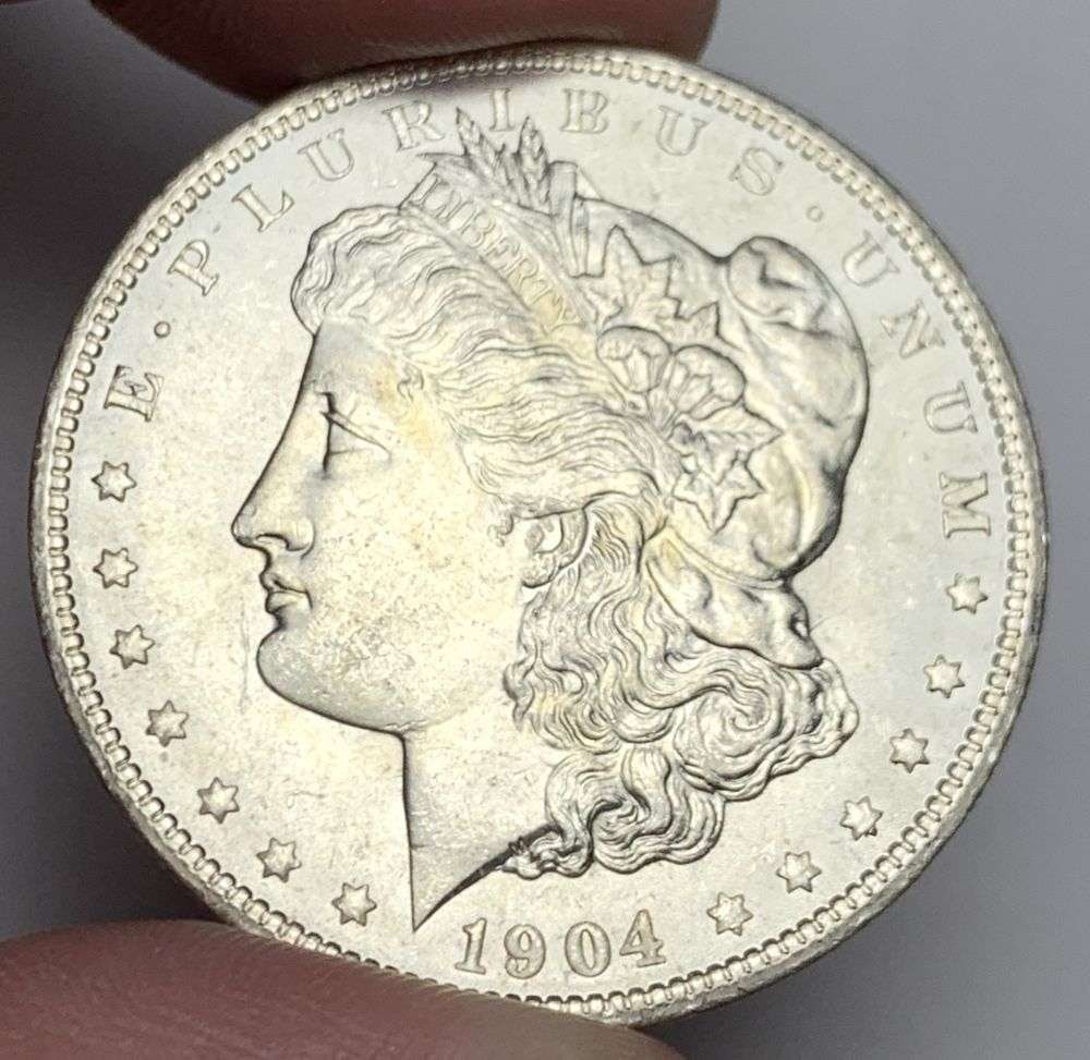 1904-O Morgan Silver Dollar MS65: A very special consignment. Once in a great while, some really, really nice silver dollars will hit the market. These coins come from a old, old-timer! By order of the consignor, none of these coins a