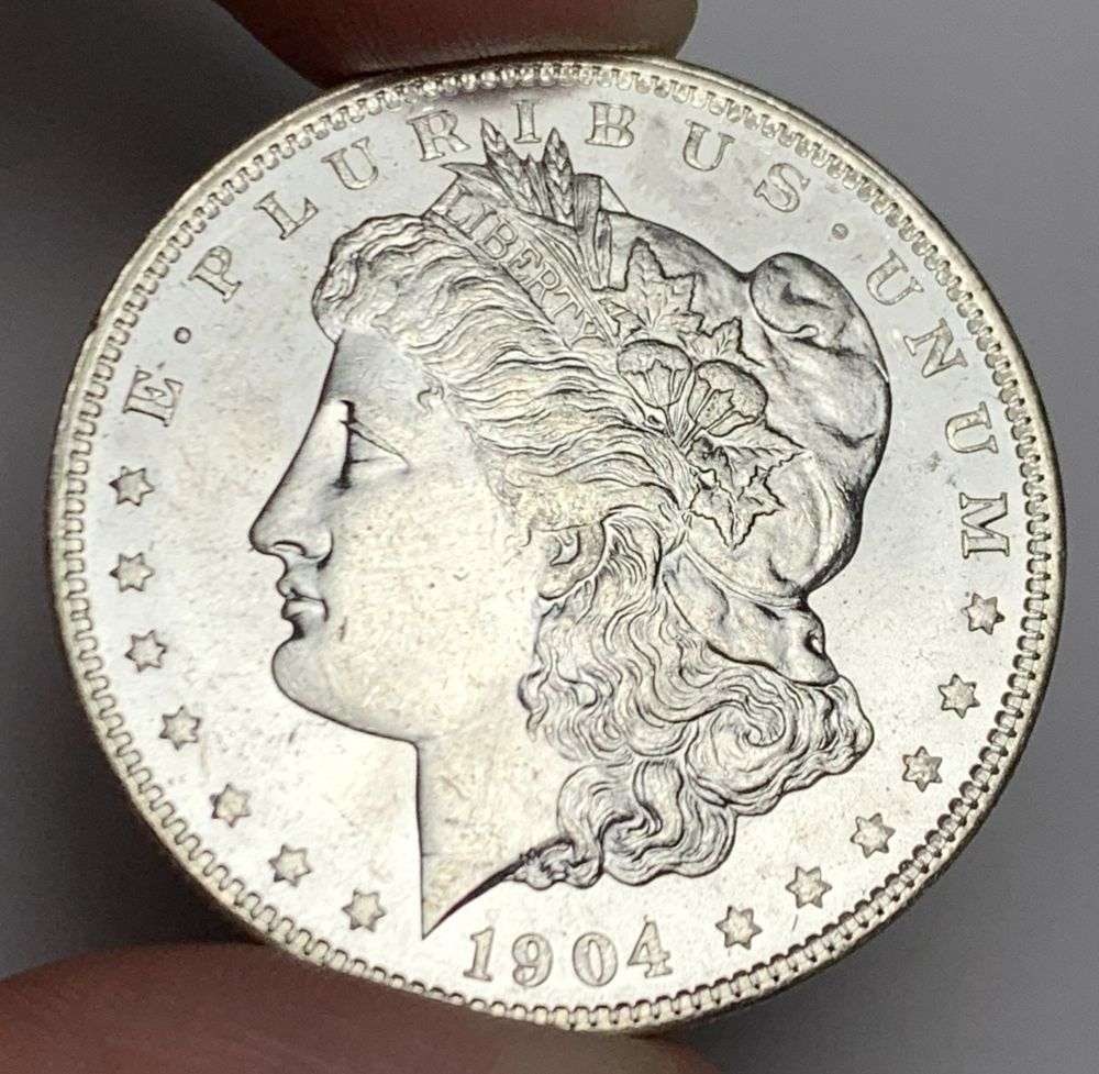 1904-O Morgan Silver Dollar MS66: A very special consignment. Once in a great while, some really, really nice silver dollars will hit the market. These coins come from a old, old-timer! By order of the consignor, none of these coins a