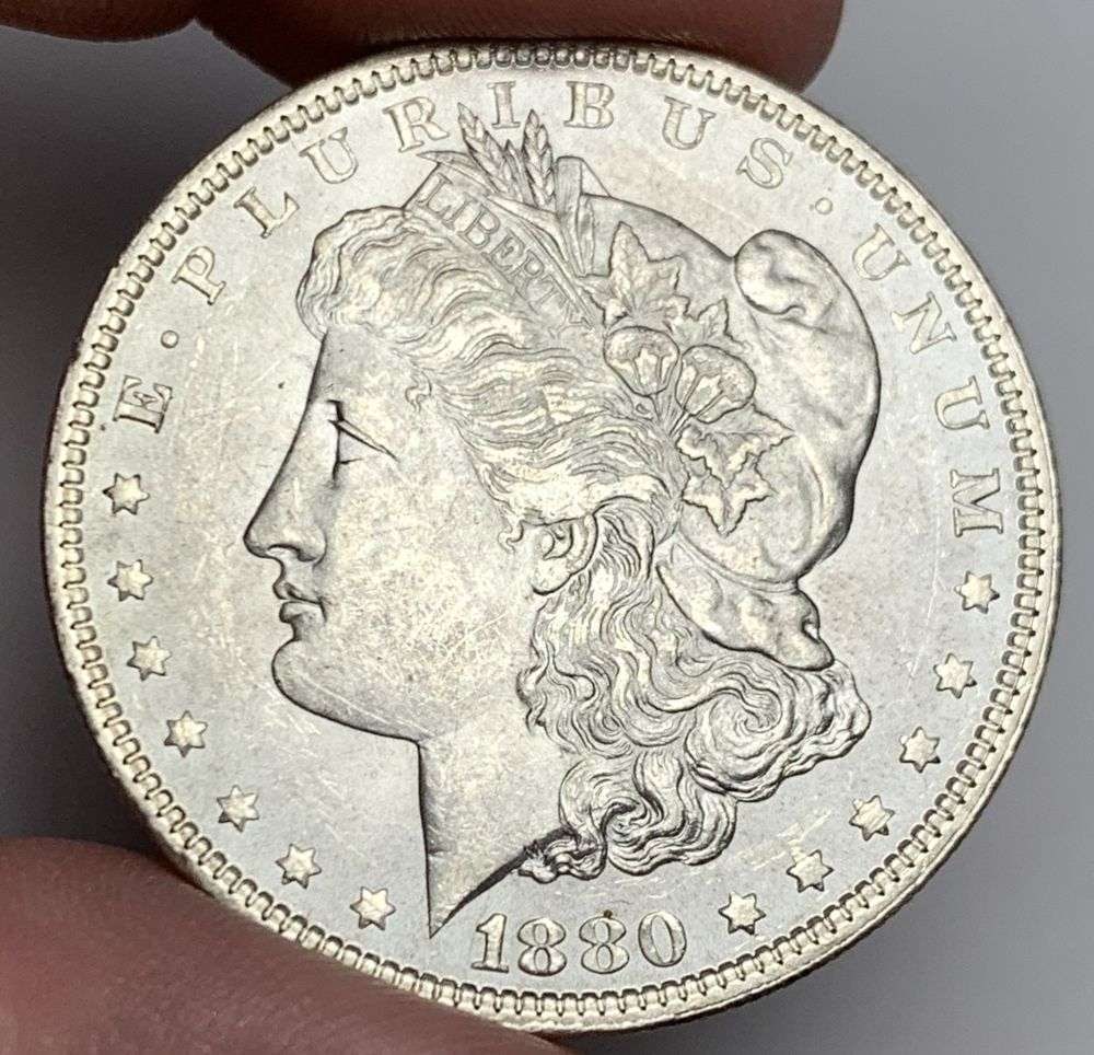 1880 Morgan Silver Dollar MS64: A very special consignment. Once in a great while, some really, really nice silver dollars will hit the market. These coins come from a old, old-timer! By order of the consignor, none of these coins a