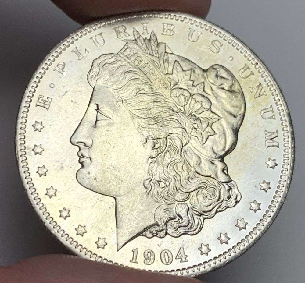 1904-O Morgan Silver Dollar MS65: A very special consignment. Once in a great while, some really, really nice silver dollars will hit the market. These coins come from a old, old-timer! By order of the consignor, none of these coins a