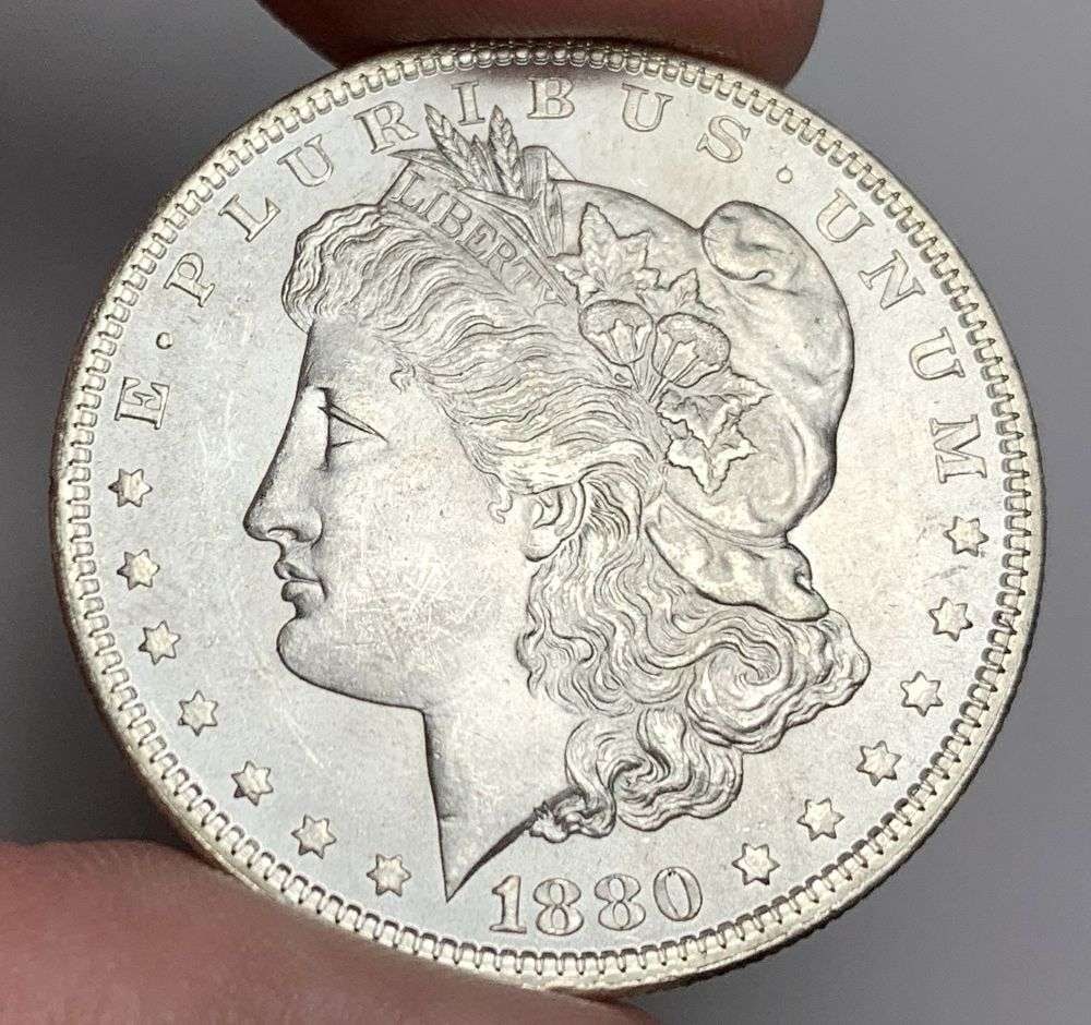 1880 Morgan Silver Dollar MS64: A very special consignment. Once in a great while, some really, really nice silver dollars will hit the market. These coins come from a old, old-timer! By order of the consignor, none of these coins a
