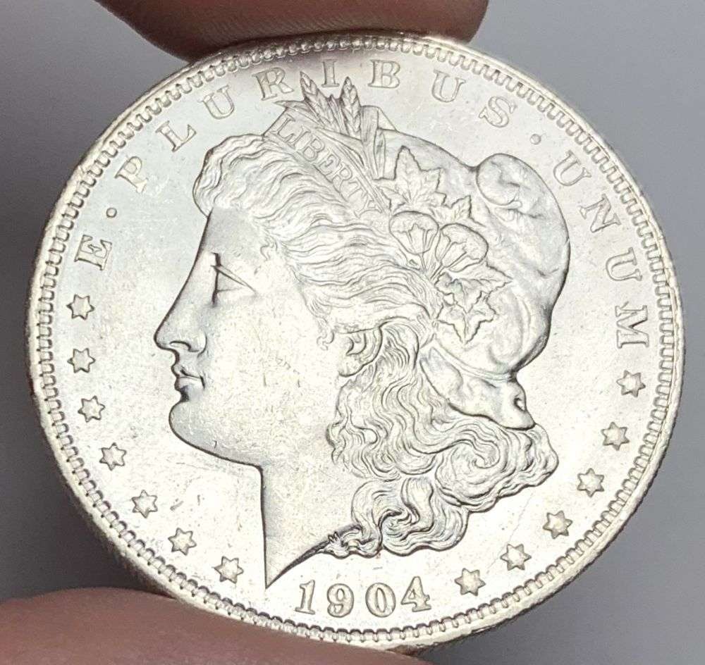 1904-O Morgan Silver Dollar MS65: A very special consignment. Once in a great while, some really, really nice silver dollars will hit the market. These coins come from a old, old-timer! By order of the consignor, none of these coins a