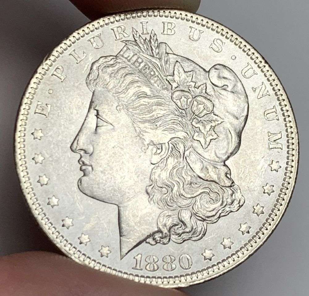 1880 Morgan Silver Dollar MS64: A very special consignment. Once in a great while, some really, really nice silver dollars will hit the market. These coins come from a old, old-timer! By order of the consignor, none of these coins a