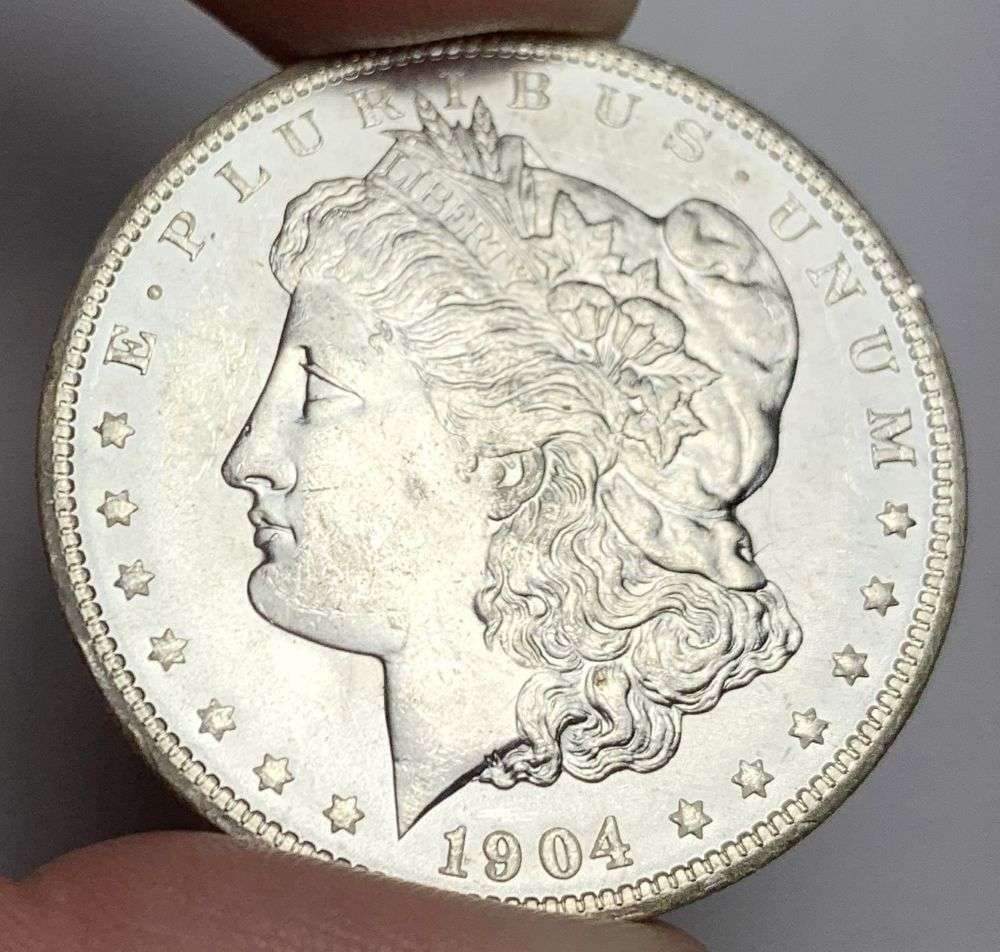 1904-O Morgan Silver Dollar MS65: A very special consignment. Once in a great while, some really, really nice silver dollars will hit the market. These coins come from a old, old-timer! By order of the consignor, none of these coins a