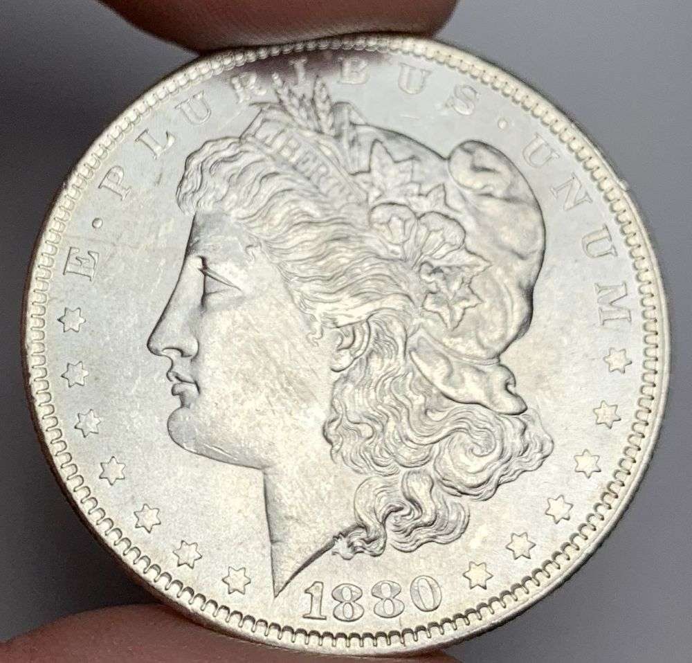1880 Morgan Silver Dollar MS65: A very special consignment. Once in a great while, some really, really nice silver dollars will hit the market. These coins come from a old, old-timer! By order of the consignor, none of these coins a