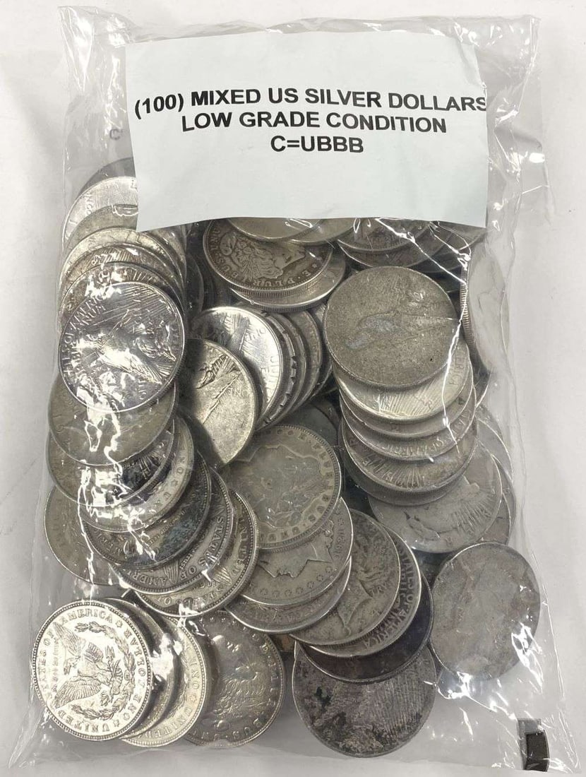(100) Mixed U.S. Silver Dollars Low Grade: Winner shall receive (1) bag of (100) mixed low grade U.S. silver dollars. Please allow 2-4 weeks for delivery. (RR/UBBB)