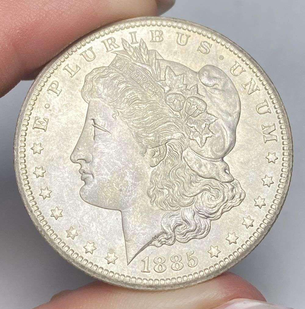 Last Minute! 1885-CC Morgan Silver Dollar MS65: Winner shall receive the exact coin shown here. (RR/PBB)