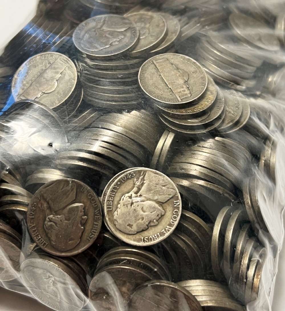 $50 Face Silver World War 2 Nickels (1,000-coins): Part of our greatest moment as patriotic Americans happened during World War 2. It was the year 1941, the war was raging on, and there was a problem - We needed more of the metal, Nickel. The decision