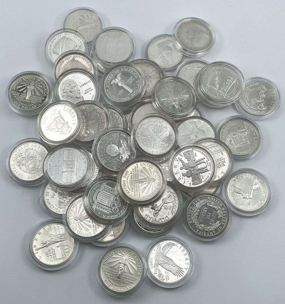 (50) United States Commemorative Silver Dollars: Each coin has an ASW of 0.7734 ozt. That means each bag contains 38.67 ozt of ASW. Winner shall receive (1) bag (50-coins) precisely resembling the one shown here. Please allow 2-4 weeks for shipping.