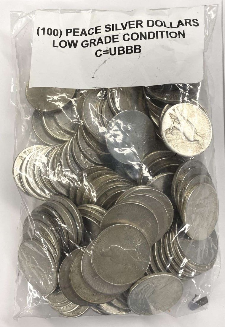 (100) Low Grade Peace Silver Dollars: Winner shall receive (100-coins) precisely resembling the coins shown here. Technically there are no nice coins in here. All of the coins enclosed in this bag have been rejected from our better peace 