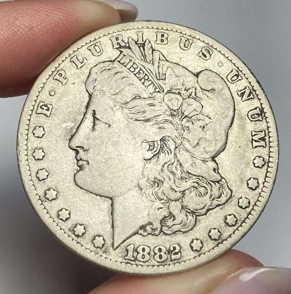 1882-CC Morgan Silver Dollar VF: Winner shall receive the exact coin shown here. (RR/B)