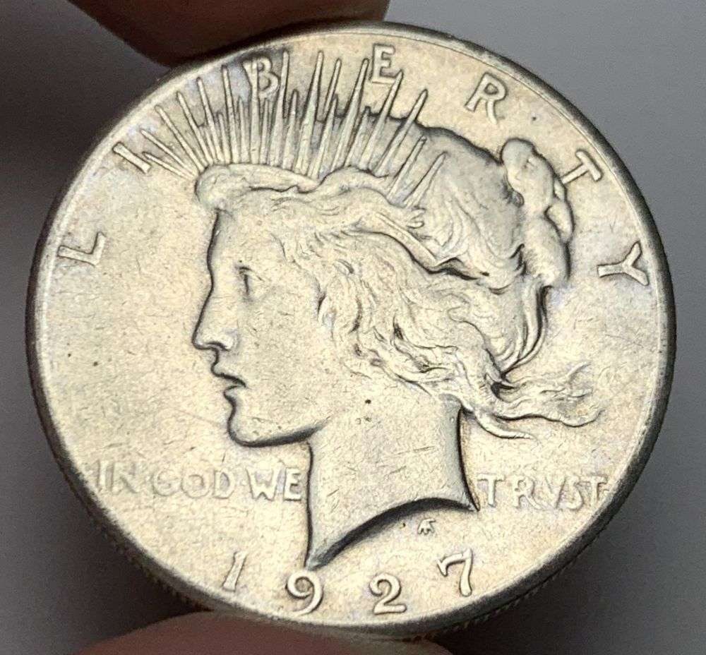 1927 Peace Silver Dollar XF: Winner shall recieve the exact coin shown here. (MR/B)