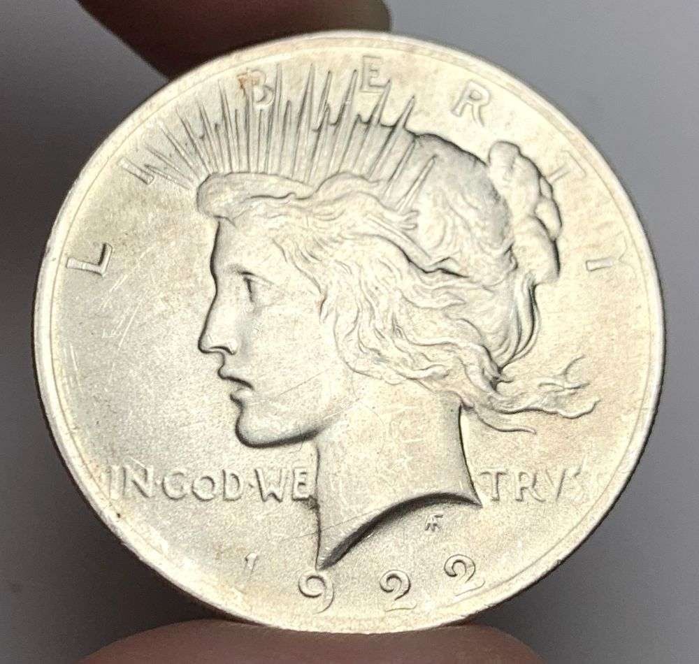 1922 Peace Silver Dollar MS63: A very special consignment. Once in a great while, some really, really nice silver dollars will hit the market. These coins come from a old, old-timer! By order of the consignor, none of these coins a