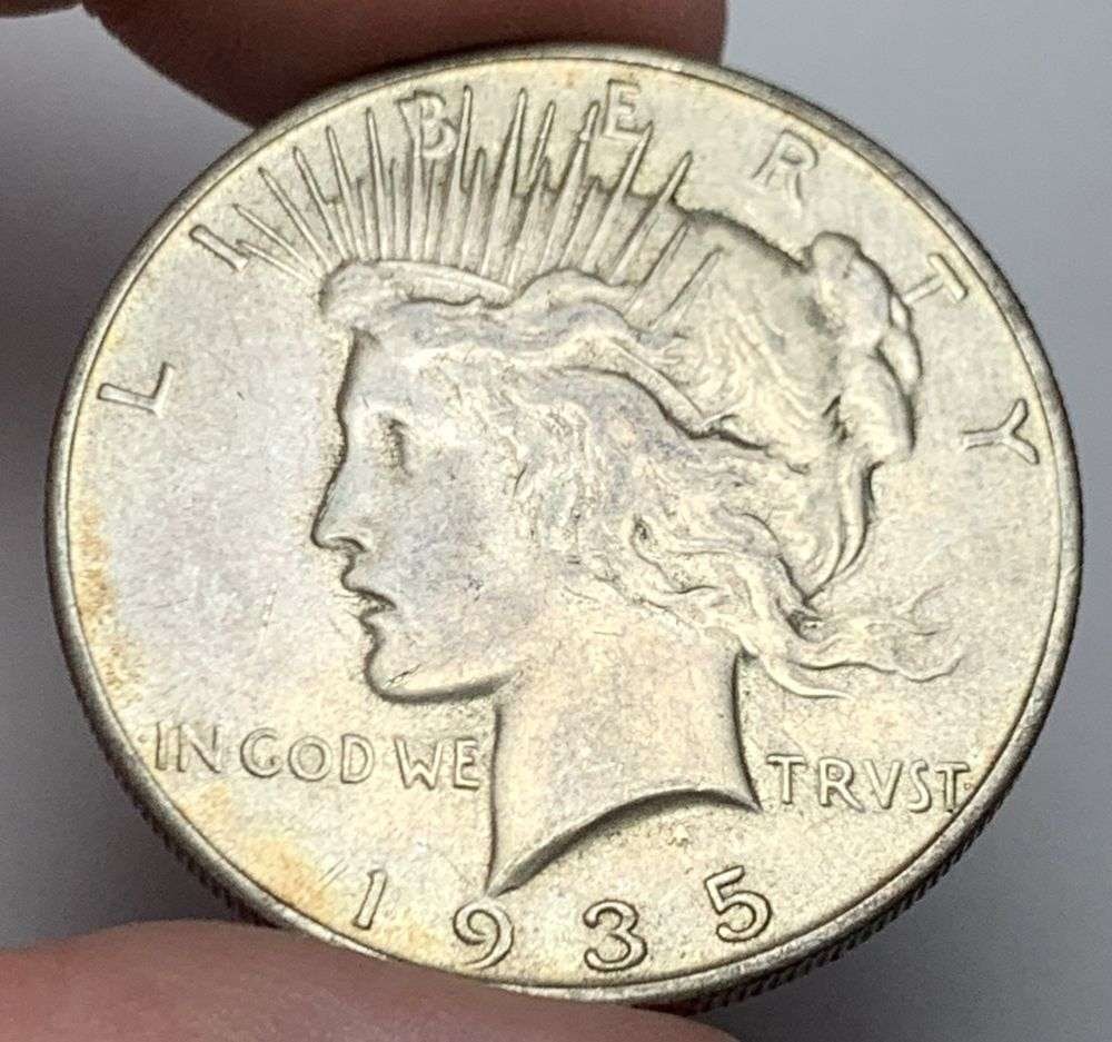 1935-S Peace Silver Dollar AU55: Winner shall recieve the exact coin shown here. (MR/B)