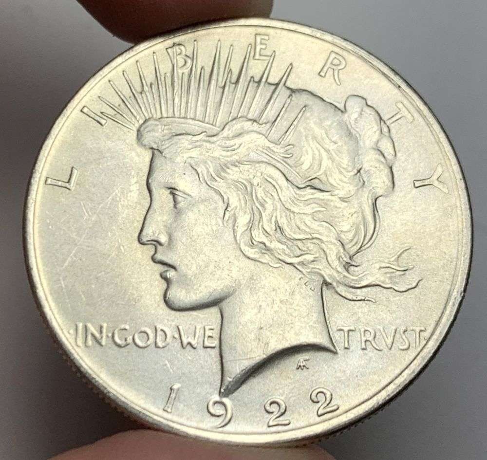 1922 Peace Silver Dollar MS63: A very special consignment. Once in a great while, some really, really nice silver dollars will hit the market. These coins come from a old, old-timer! By order of the consignor, none of these coins a