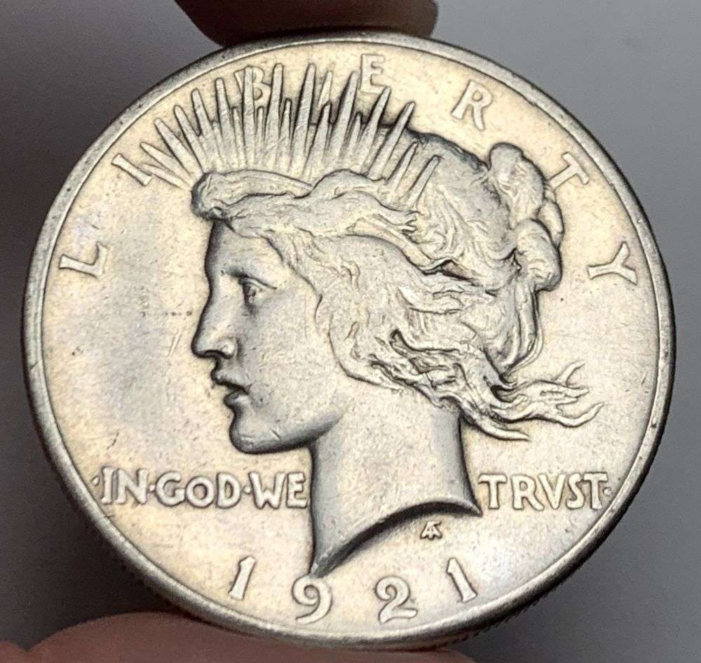 1921 Peace Silver Dollar VF: Winner shall recieve the exact coin shown here. (MR/B)