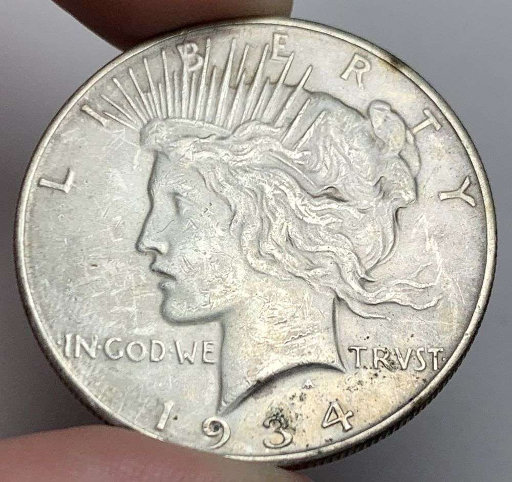 1934-D Peace Silver Dollar AU50: Winner shall recieve the exact coin shown here. (MR/B)