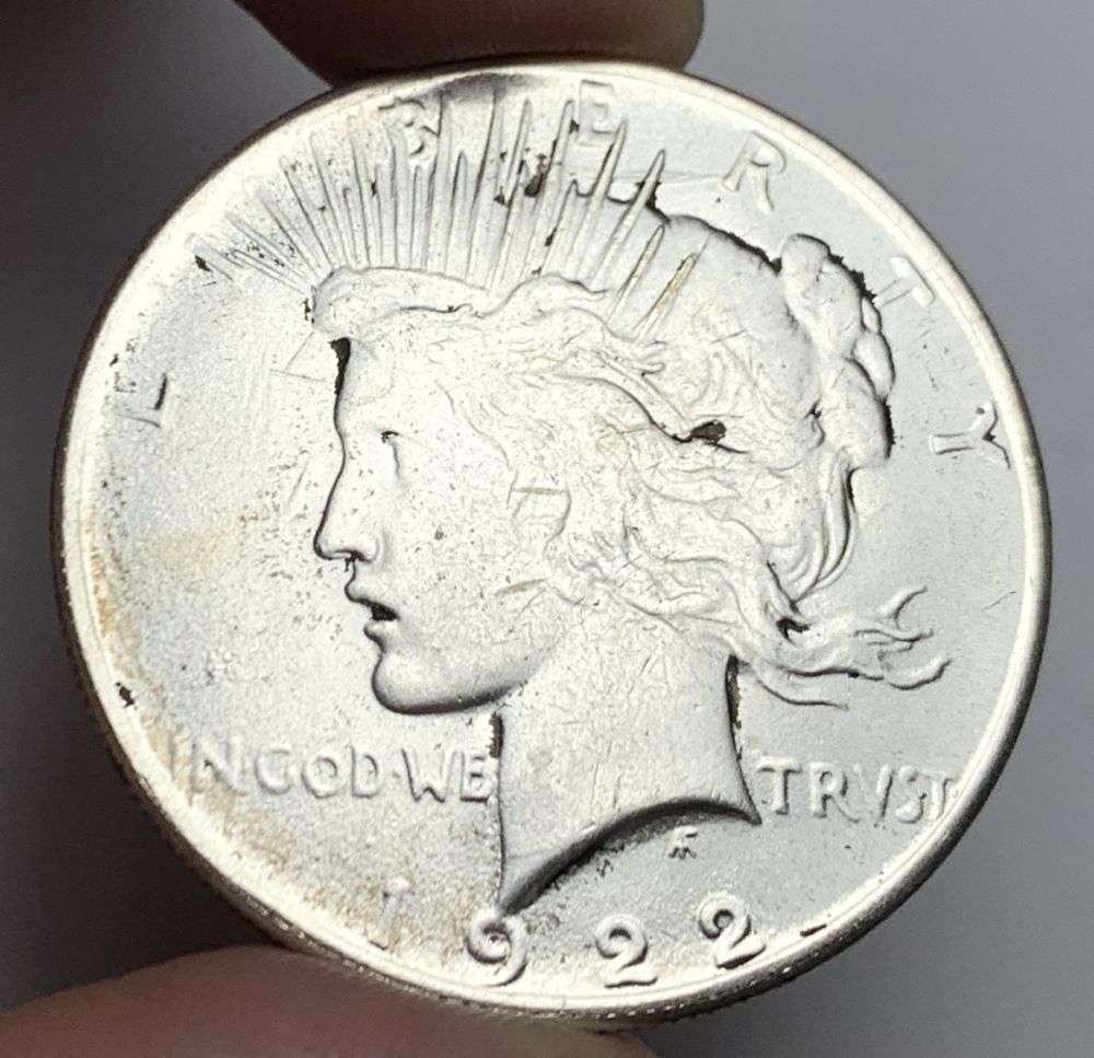 1922-D Peace Silver Dollar MS63: A very special consignment. Once in a great while, some really, really nice silver dollars will hit the market. These coins come from a old, old-timer! By order of the consignor, none of these coins a