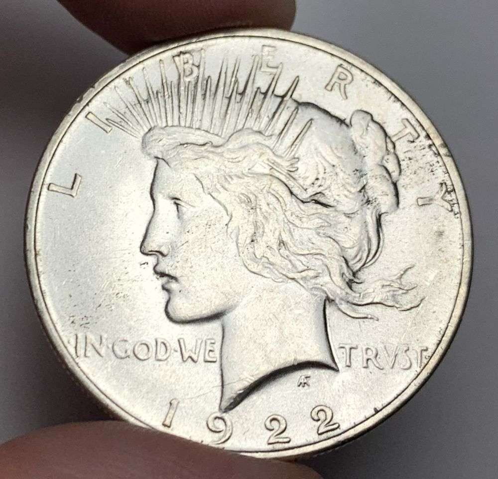 1922-D Peace Silver Dollar MS63: A very special consignment. Once in a great while, some really, really nice silver dollars will hit the market. These coins come from a old, old-timer! By order of the consignor, none of these coins a