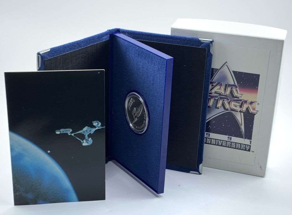 1991 Star Trek U.S.S. Enterprise 25th Anniversary Commemorative Proof 1 ozt .999 Silver: Winner shall receive the exact coin shown here. (MR/B)