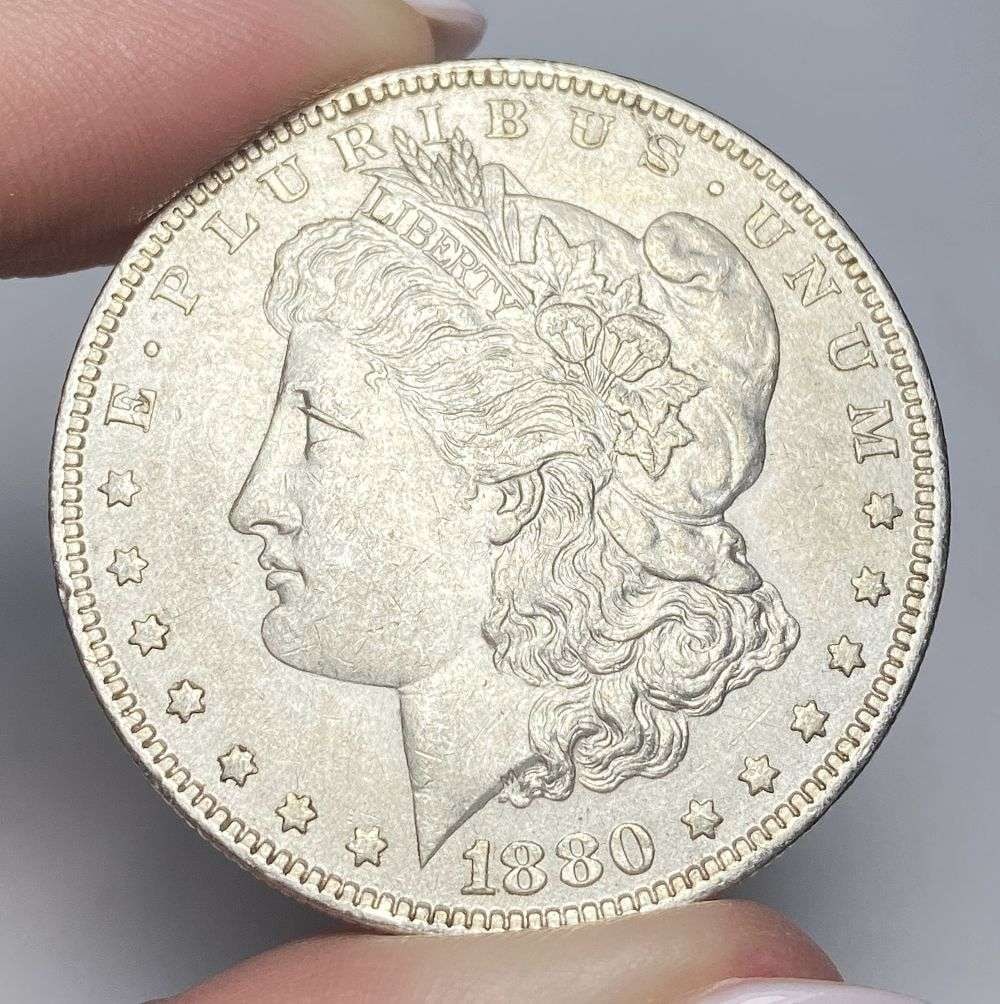 1880-O Morgan Silver Dollar MS62: Winner shall receive the exact coin shown here. (RR/B)