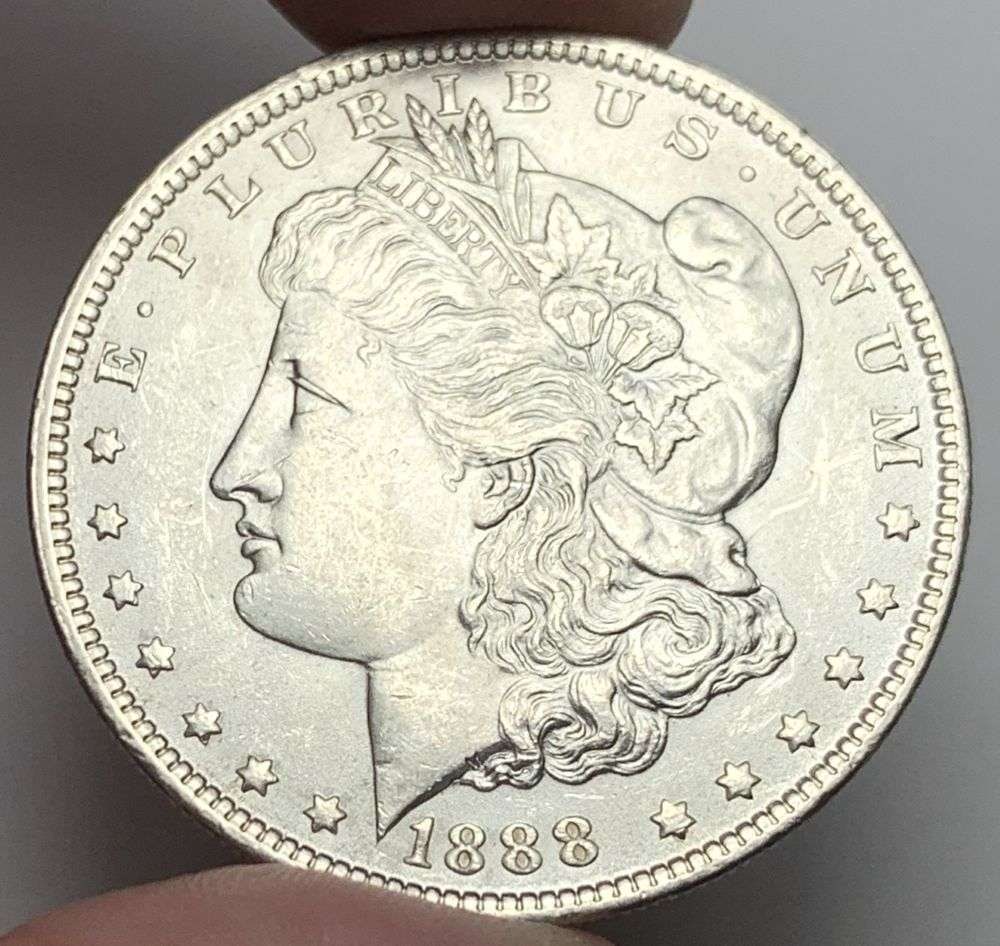 1888 Morgan Silver Dollar MS64: A very special consignment. Once in a great while, some really, really nice silver dollars will hit the market. These coins come from a old, old-timer! By order of the consignor, none of these coins a