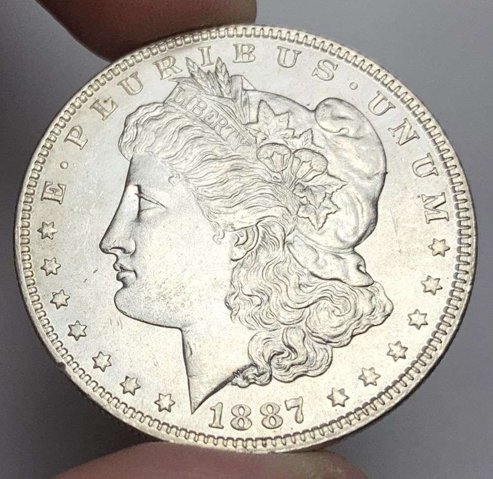 1887 Morgan Silver Dollar MS64: A very special consignment. Once in a great while, some really, really nice silver dollars will hit the market. These coins come from a old, old-timer! By order of the consignor, none of these coins a
