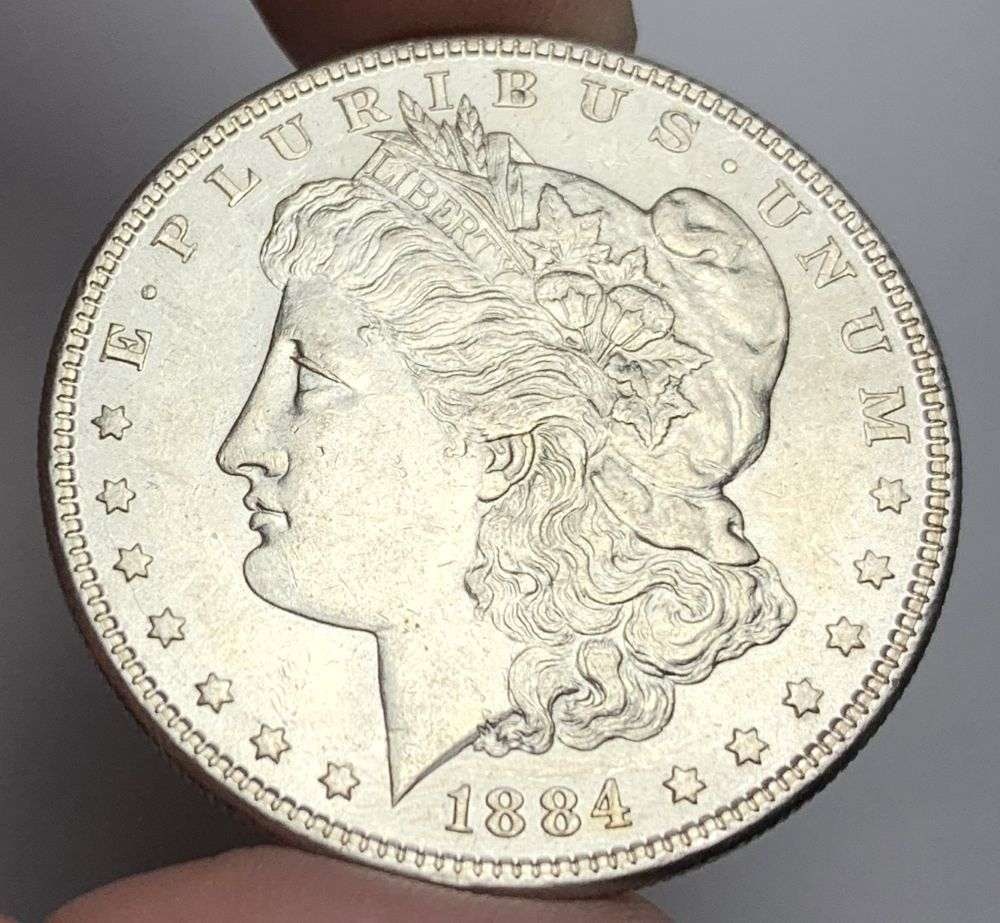 1884 Morgan Silver Dollar MS63: A very special consignment. Once in a great while, some really, really nice silver dollars will hit the market. These coins come from a old, old-timer! By order of the consignor, none of these coins a