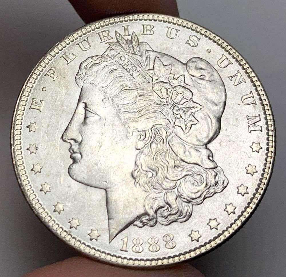 1888 Morgan Silver Dollar MS63: A very special consignment. Once in a great while, some really, really nice silver dollars will hit the market. These coins come from a old, old-timer! By order of the consignor, none of these coins a