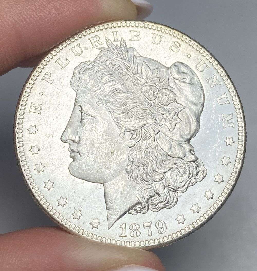 1879-S Rev. 78 Morgan Silver Dollar MS62: A very special consignment. Once in a great while, some really, really nice silver dollars will hit the market. These coins come from a old, old-timer! By order of the consignor, none of these coins a