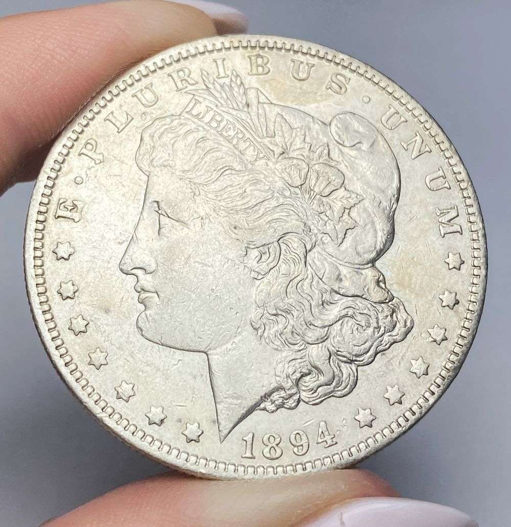 1894-O Morgan Silver Dollar AU58: Winner shall recieve the exact coin shown here. (MR/B)