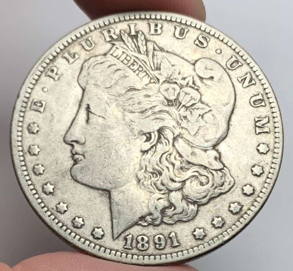 1891-CC Morgan Silver Dollar VF: Winner shall receive the exact coin shown here. (MR/LRB)