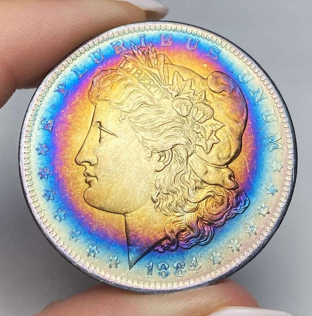 Rainbow Toned 1884-O Morgan Silver Dollar (1 of 2)