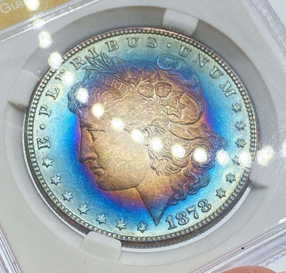 Rainbow 1878 7/8TF Strong Morgan Silver Dollar MS65: IMPORTANT NOTE: We do not agree with the grade provided with this "off-brand" grading company. Winner shall receive the exact coin shown here. (RR)