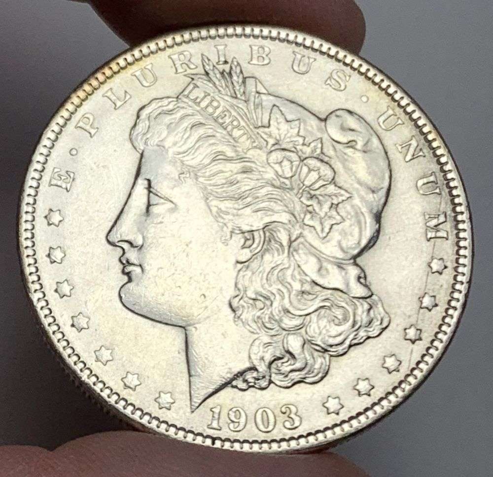 1903 Morgan Silver Dollar MS63: Winner shall receive the exact coin shown here. (MR/OB)