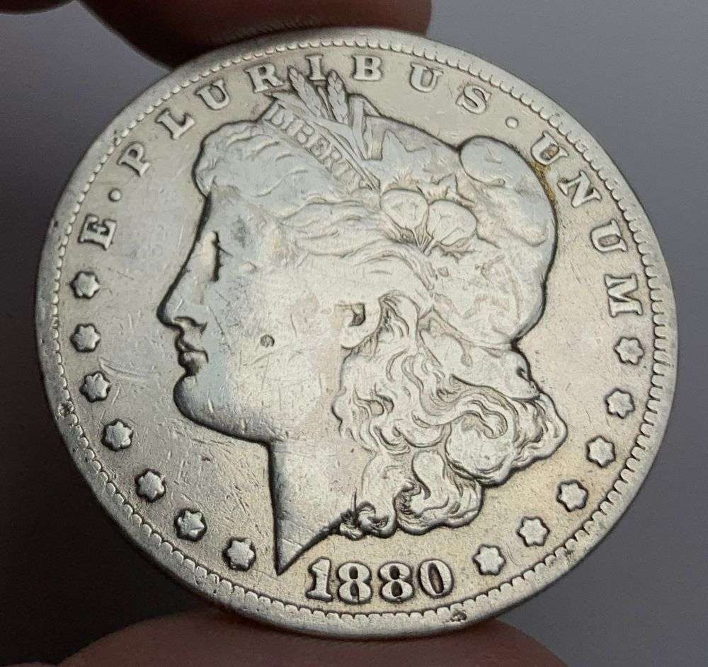 1880-CC Morgan Silver Dollar VF: Winner shall receive the exact coin shown here. (MR/LBB)