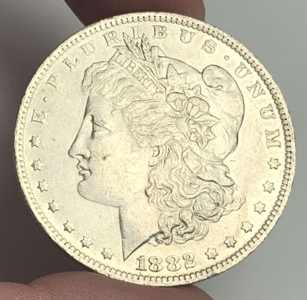 1882-O Morgan Silver Dollar MS63: A very special consignment. Once in a great while, some really, really nice silver dollars will hit the market. These coins come from a old, old-timer! By order of the consignor, none of these coins a