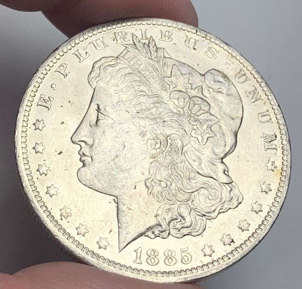 1885-O Morgan Silver Dollar MS65: A very special consignment. Once in a great while, some really, really nice silver dollars will hit the market. These coins come from a old, old-timer! By order of the consignor, none of these coins a