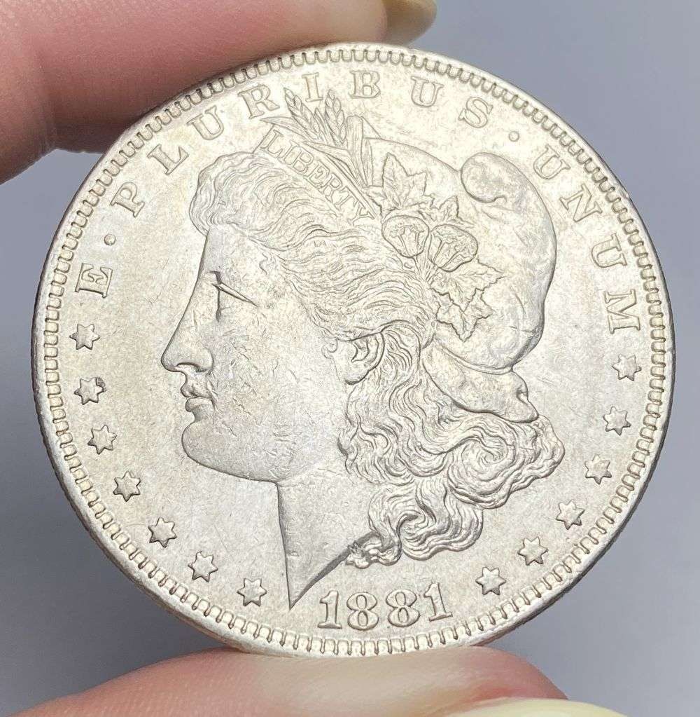 1881-O Morgan Silver Dollar MS63: Winner shall receive the exact coin shown here. (RR/PB)