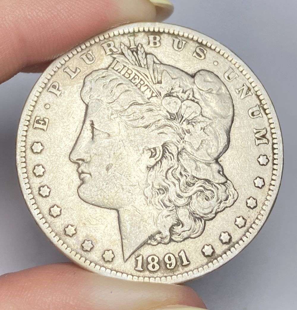 1891-CC Morgan Silver Dollar VF: Winner shall receive the exact coin shown here. (RR/PB)