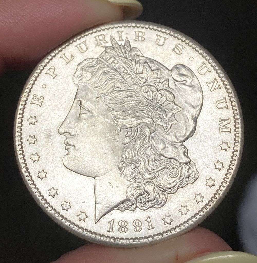 1891-S Morgan Silver Dollar MS65: A very special consignment. Once in a great while, some really, really nice silver dollars will hit the market. These coins come from a old, old-timer! By order of the consignor, none of these coins a