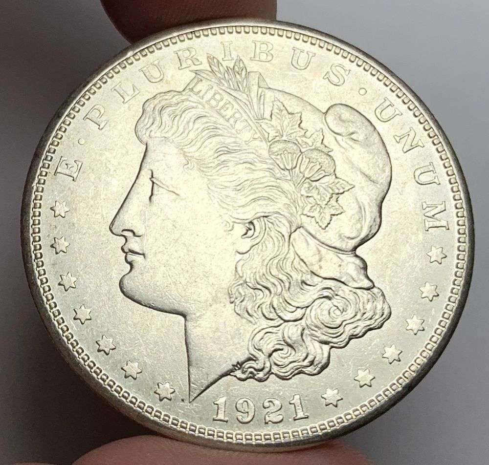 1921-S Morgan Silver Dollar MS64: A very special consignment. Once in a great while, some really, really nice silver dollars will hit the market. These coins come from a old, old-timer! By order of the consignor, none of these coins a