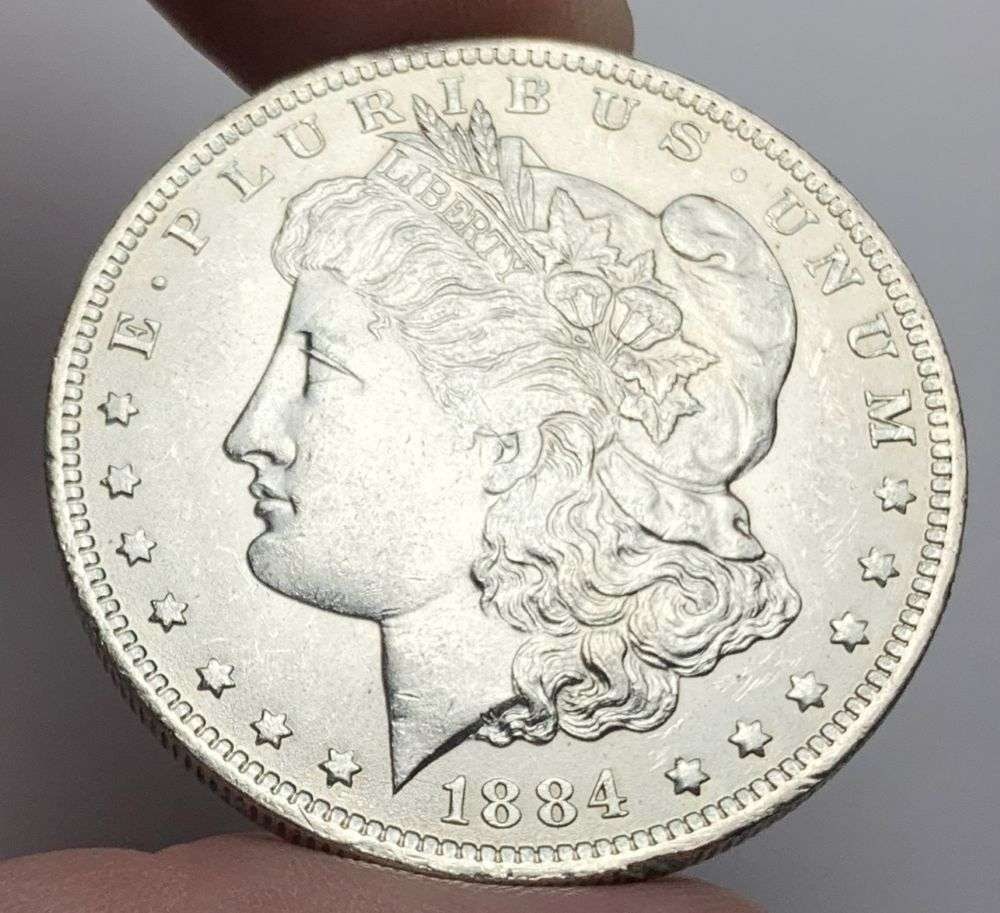 1884-O Morgan Silver Dollar MS63: A very special consignment. Once in a great while, some really, really nice silver dollars will hit the market. These coins come from a old, old-timer! By order of the consignor, none of these coins a