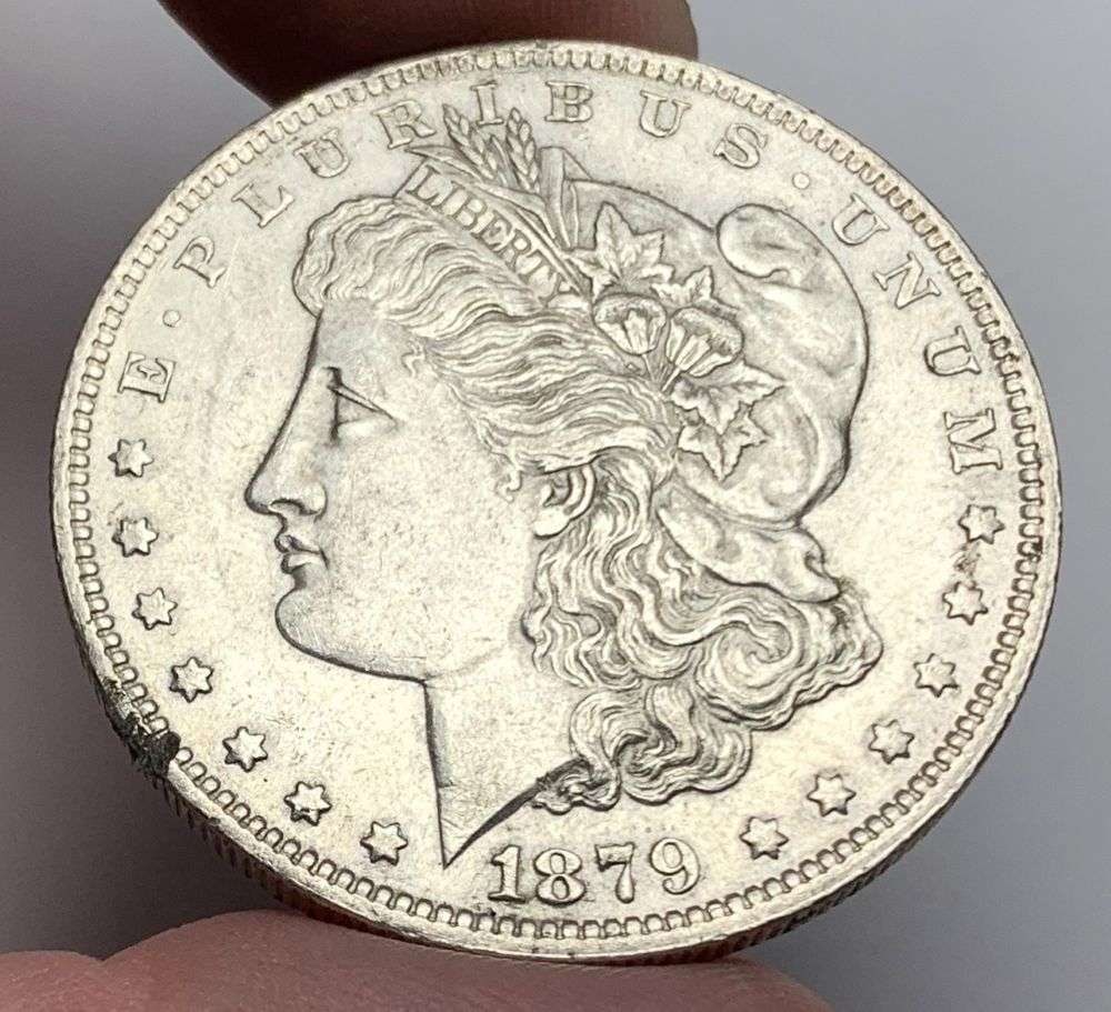 1879-O Morgan Silver Dollar AU58: A very special consignment. Once in a great while, some really, really nice silver dollars will hit the market. These coins come from a old, old-timer! By order of the consignor, none of these coins a